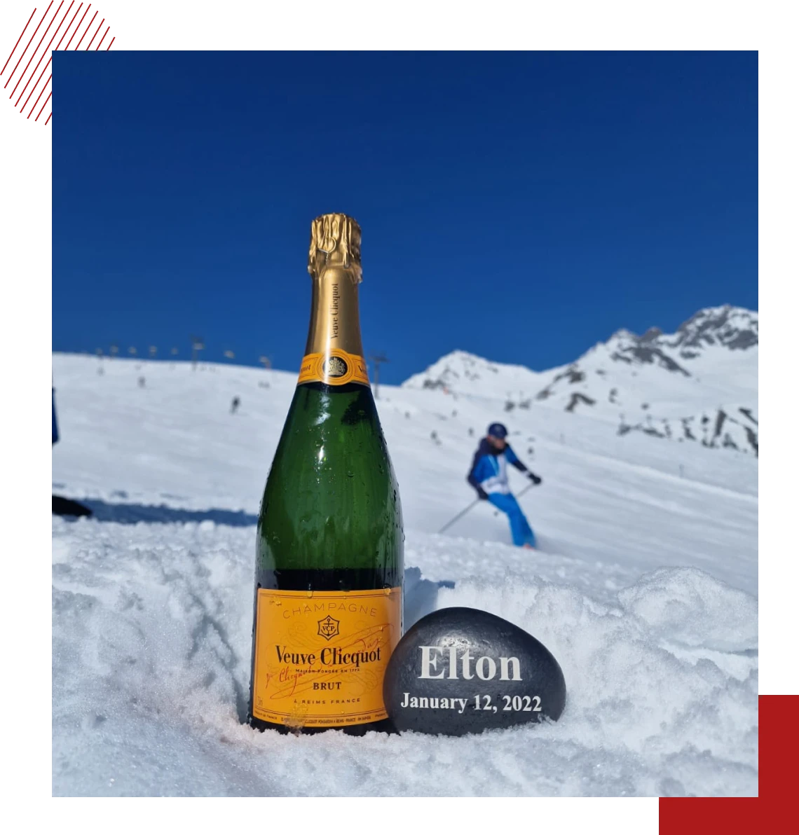 Champagne bottle on snowy mountain